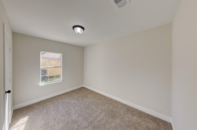 empty room featuring carpet