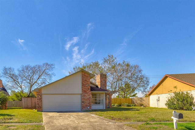 view of side of home with a garage and a yard