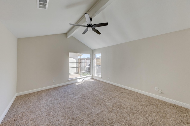 carpeted empty room featuring ceiling fan and lofted ceiling with beams