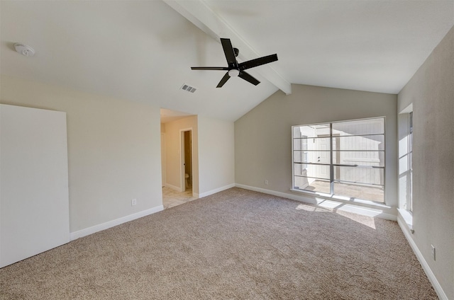 unfurnished room featuring light carpet, ceiling fan, and lofted ceiling with beams