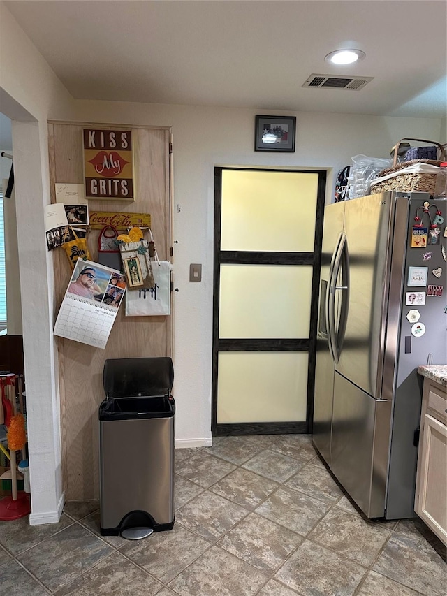 kitchen with stainless steel fridge