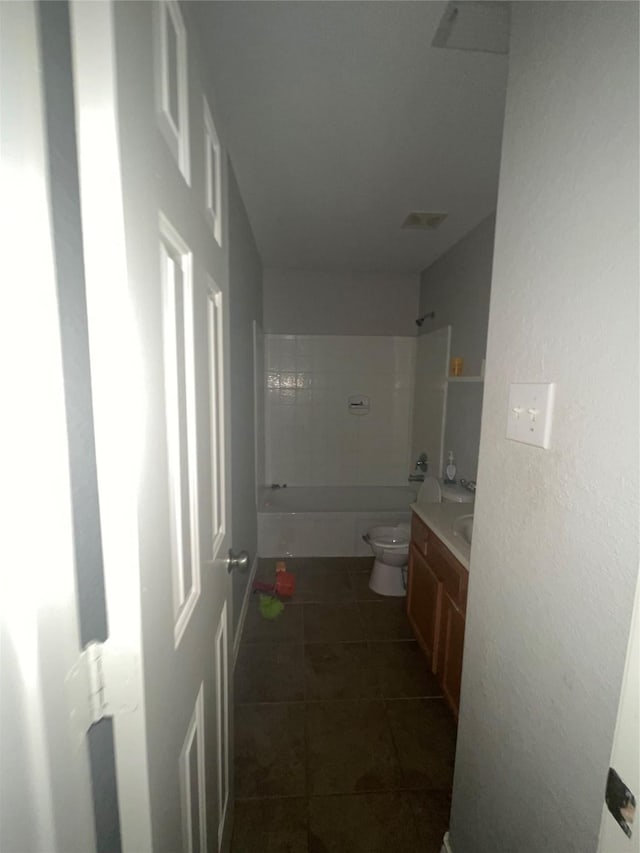 full bathroom with vanity, tile patterned floors, toilet, and shower / bath combination