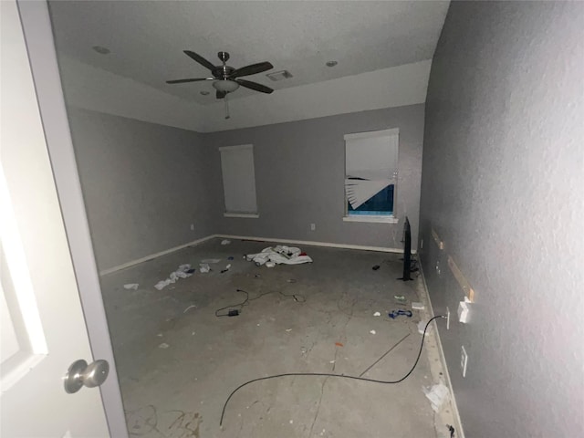 spare room with ceiling fan