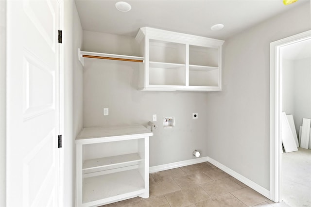 laundry room featuring light tile patterned flooring, electric dryer hookup, and washer hookup