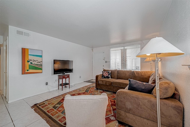 living room featuring light tile patterned floors