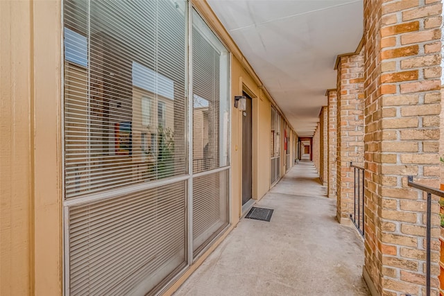 corridor with brick wall