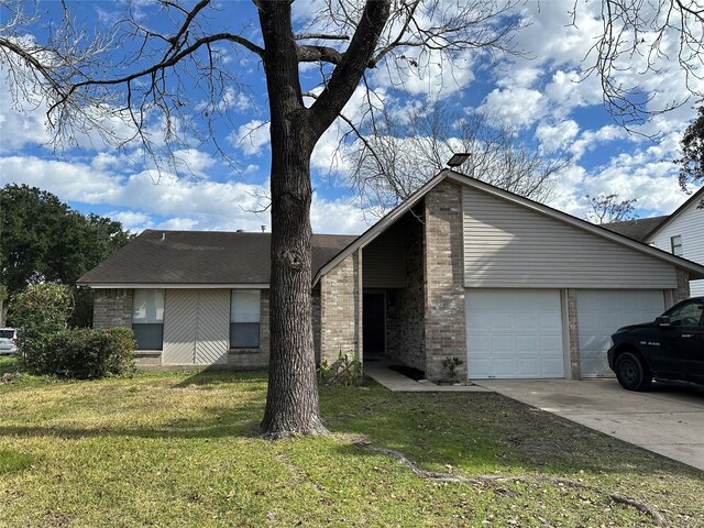 single story home with a garage and a front lawn