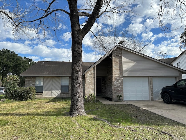 ranch-style home featuring a garage and a front lawn