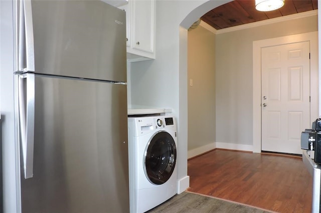 laundry room with wood ceiling, hardwood / wood-style flooring, cabinets, crown molding, and washer / clothes dryer