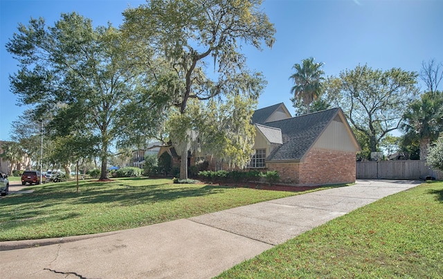 view of property exterior with a lawn