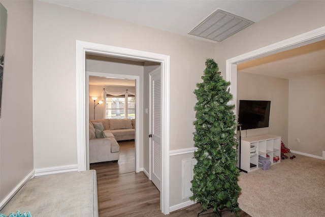 hall featuring hardwood / wood-style flooring