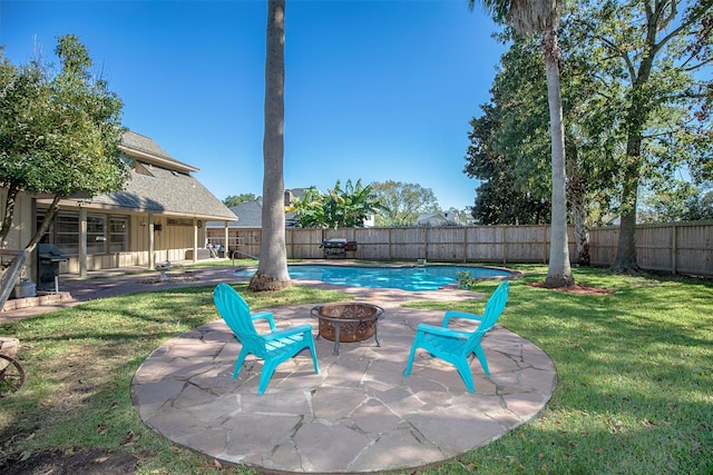 view of patio / terrace with an outdoor fire pit and area for grilling