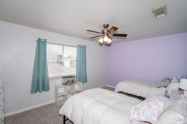 bedroom with ceiling fan and carpet floors