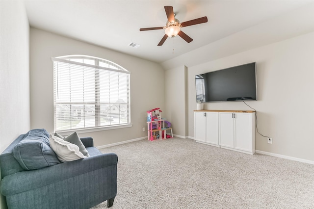 rec room featuring ceiling fan, light carpet, and vaulted ceiling