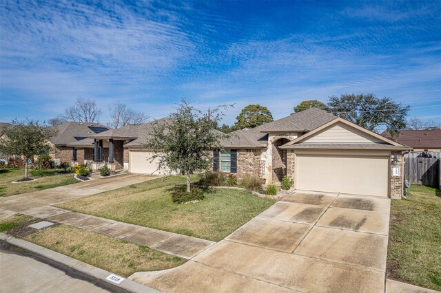 view of front facade featuring a front yard and a garage