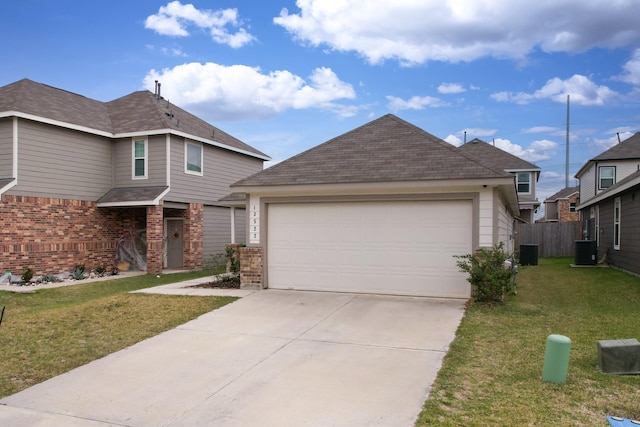 view of front facade featuring a front lawn, a garage, and central AC