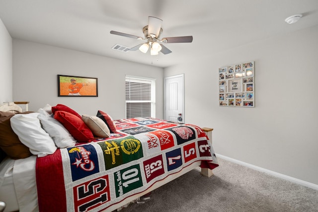 carpeted bedroom featuring ceiling fan and a closet