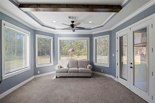 sunroom featuring ceiling fan, french doors, a raised ceiling, and visible vents