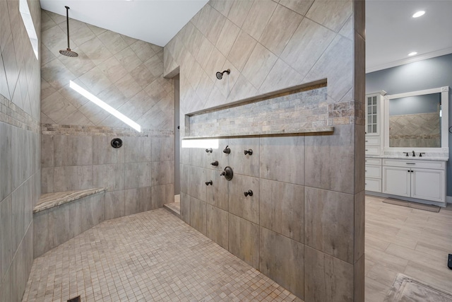 full bath with vanity, a walk in shower, and recessed lighting