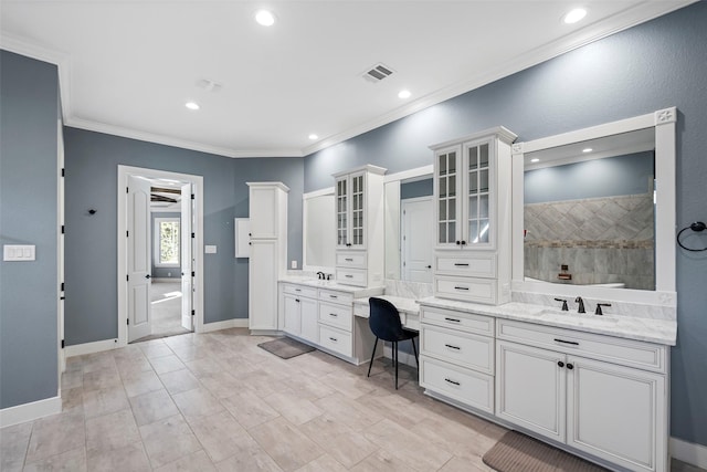 full bath featuring visible vents, ornamental molding, a sink, a walk in shower, and two vanities