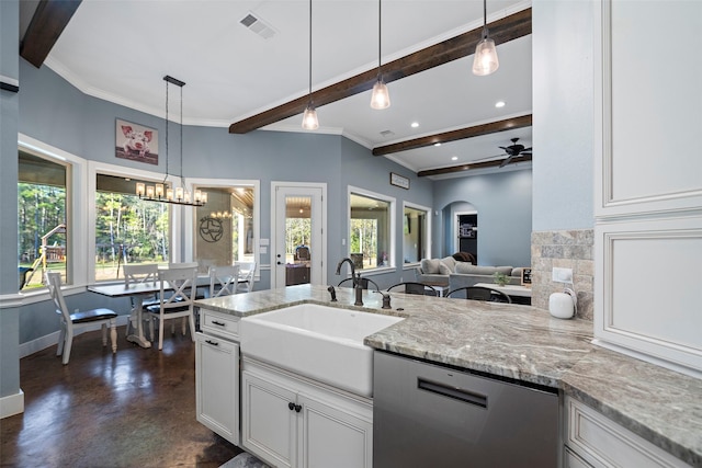 kitchen featuring light stone counters, beam ceiling, stainless steel dishwasher, a sink, and plenty of natural light