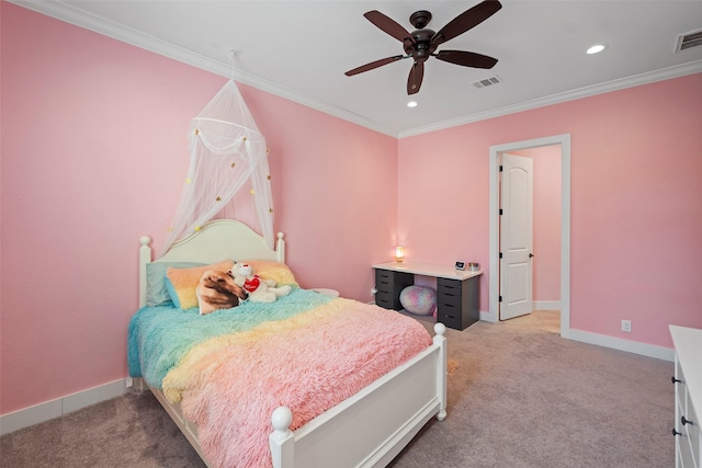 carpeted bedroom with baseboards, visible vents, and crown molding