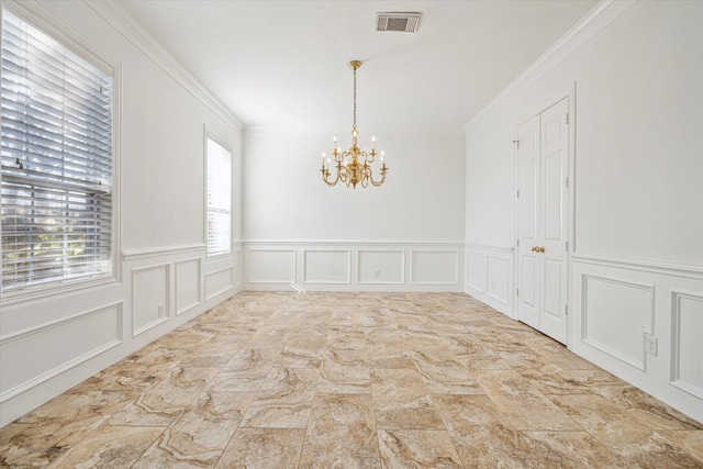 4505 Mimosa Dr, Bellaire, TX 77401 - spare room featuring crown molding and a chandelier