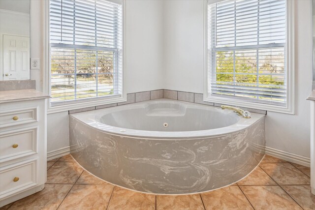 4505 Mimosa Dr, Bellaire, TX 77401 - bathroom featuring crown molding, tile patterned floors, a washtub, and vanity