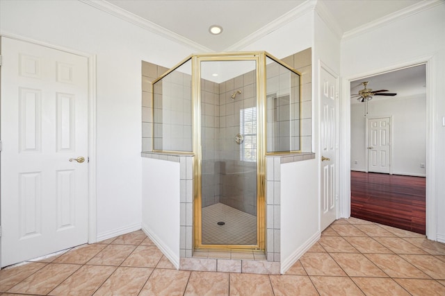 4505 Mimosa Dr, Bellaire, TX 77401 - bathroom with ceiling fan, tile patterned flooring, and ornamental molding