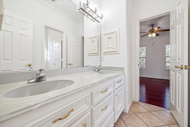 4505 Mimosa Dr, Bellaire, TX 77401 - bathroom with ceiling fan, tile patterned floors, vanity, and crown molding