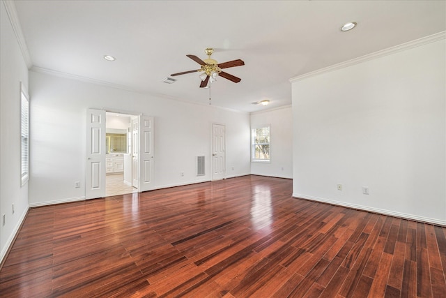 4505 Mimosa Dr, Bellaire, TX 77401 - spare room featuring ceiling fan, dark hardwood / wood-style flooring, and ornamental molding