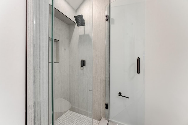 bathroom with an enclosed shower