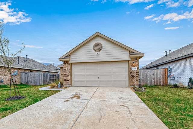 garage with a lawn