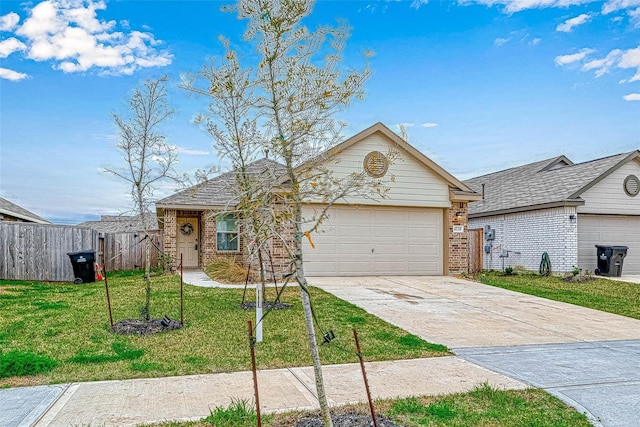 ranch-style home with a front lawn and a garage