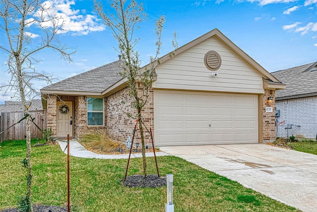 ranch-style home with a garage and a front lawn