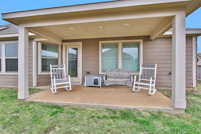 view of patio featuring a porch