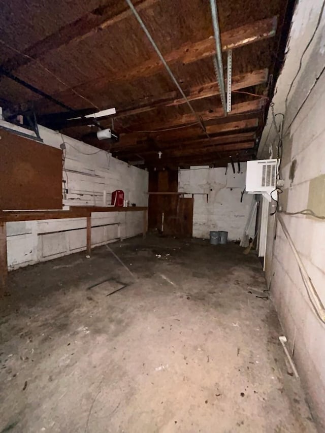 basement featuring concrete block wall