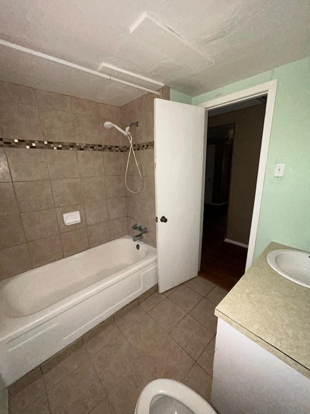 bathroom with vanity, tile patterned flooring, a textured ceiling, toilet, and shower / bathtub combination