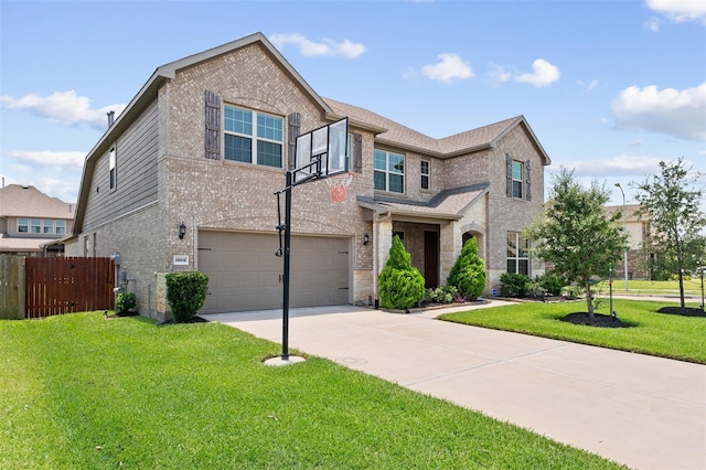 view of front of house featuring a front yard and a garage