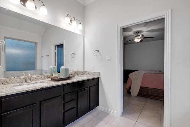 bathroom with ceiling fan, vanity, crown molding, and tile patterned flooring