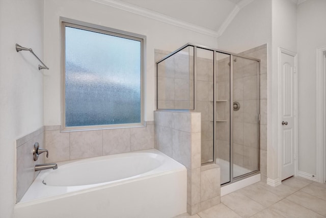 bathroom with lofted ceiling, tile patterned floors, plus walk in shower, and ornamental molding