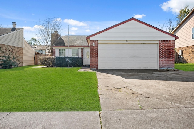 single story home with a front yard and a garage