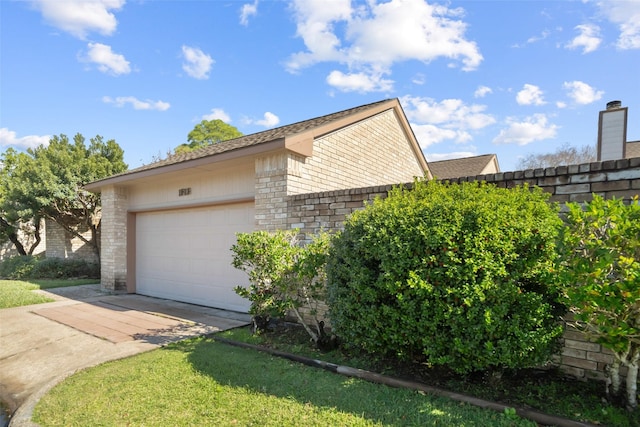 view of home's exterior with a garage