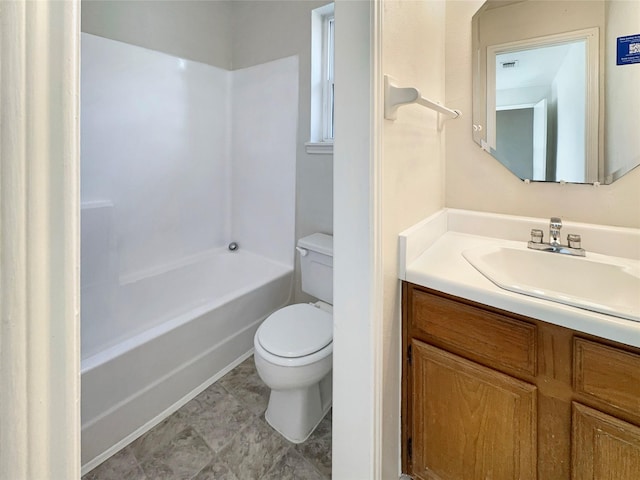 full bathroom featuring toilet, vanity, and bathtub / shower combination