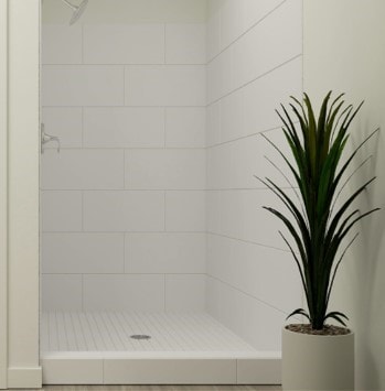 bathroom with tiled shower