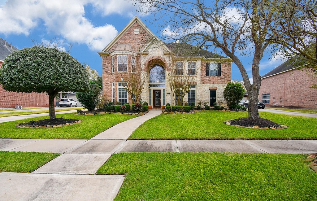 view of front of home with a front yard