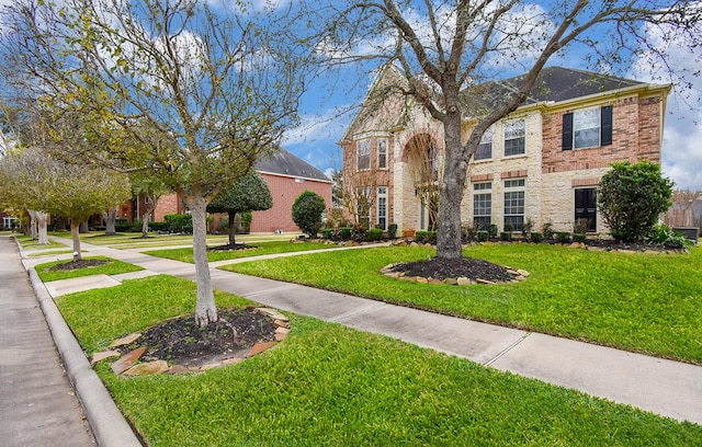 view of front of house featuring a front lawn