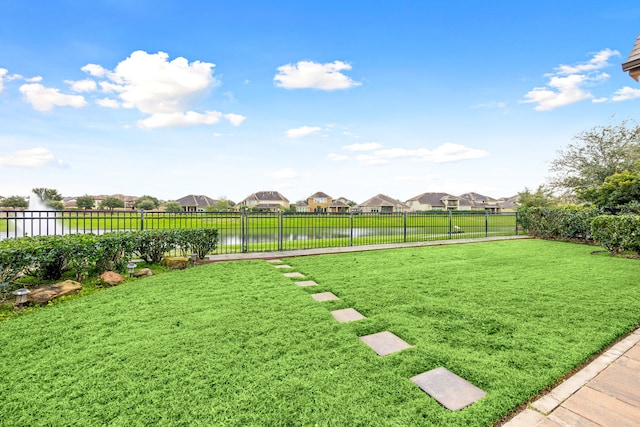 view of yard featuring a water view