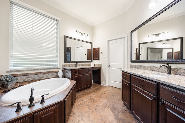 bathroom featuring a bathing tub, crown molding, and vanity