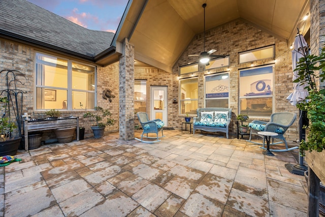 patio terrace at dusk with ceiling fan